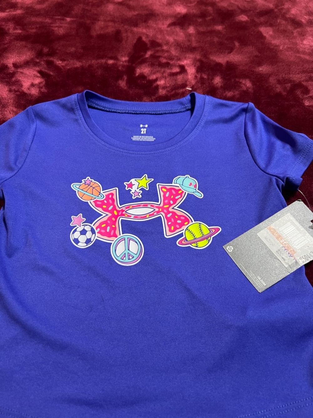 Under Armour Girls' 2t purple Graphic Logo Tee with Multi-Color Accents
